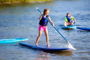 Kids on stand up paddleboard