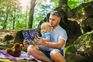Father Reading to Daughter
