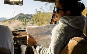 Girl with map in Car