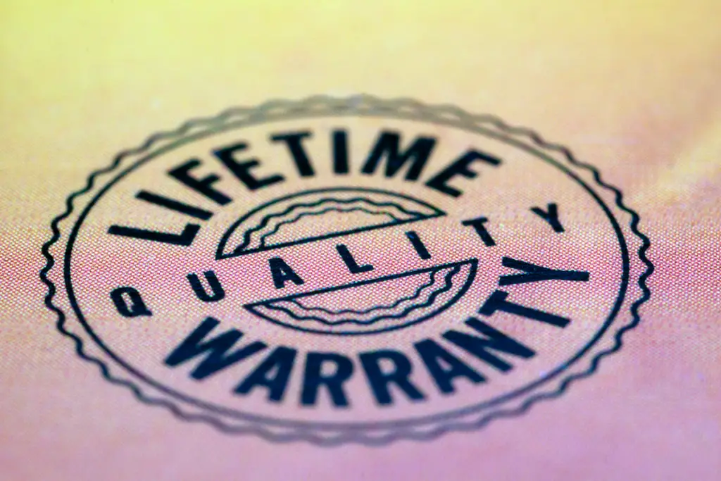 Lifetime warranty stamped on a flat surface